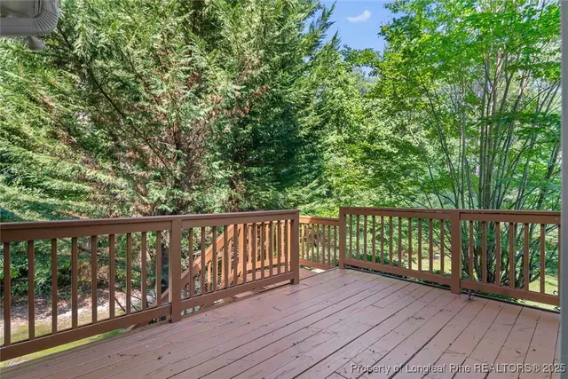 a view of a balcony with staircase