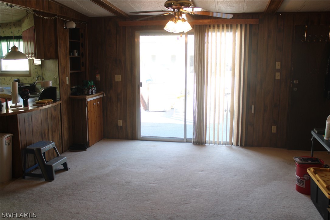 5470 Rainbow Drive Bokeelia, FL 33922 - Photo 19 of 21 a view of a room with a window and storage