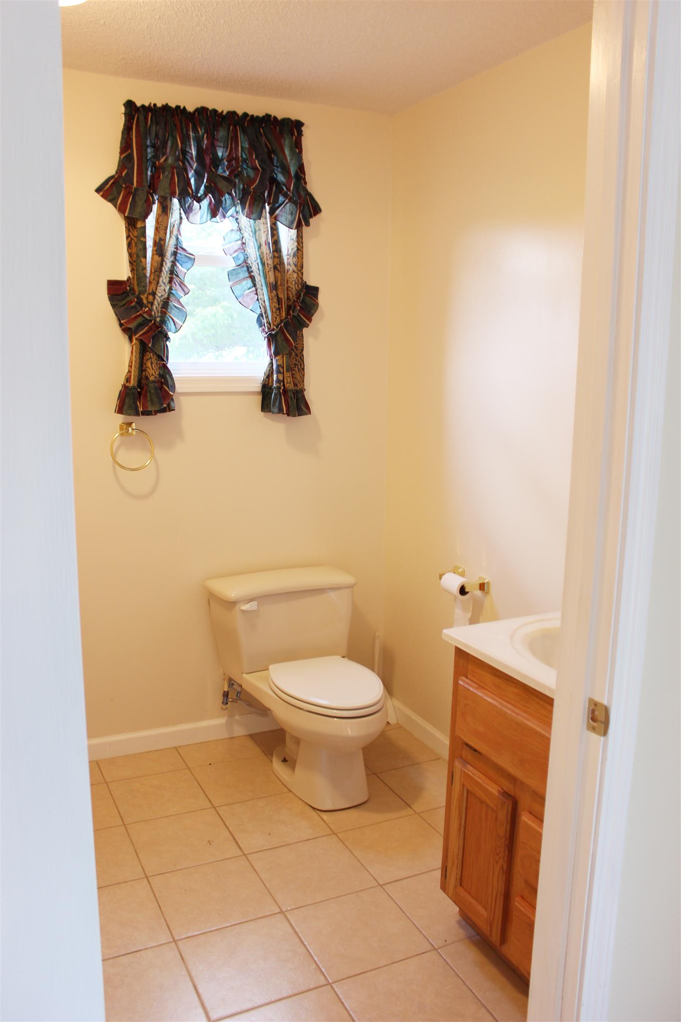 429 Williams Road Morrison, TN 37357 - Photo 15 of 30 a bathroom with a toilet and a vanity