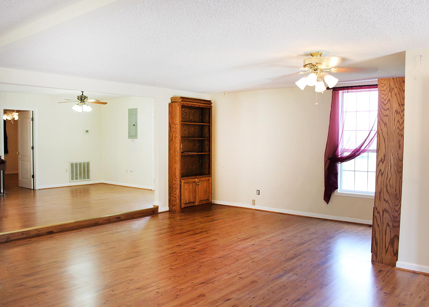 429 Williams Road Morrison, TN 37357 - Photo 10 of 30 an empty room with wooden floor and windows