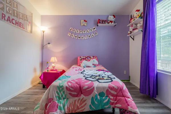 a bedroom with a bed and a bed