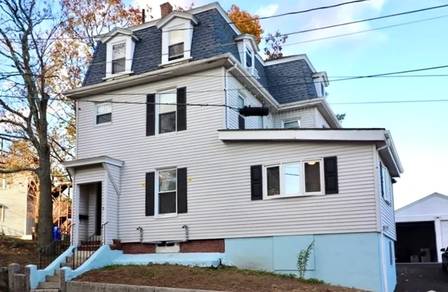 a view of a house with a garage