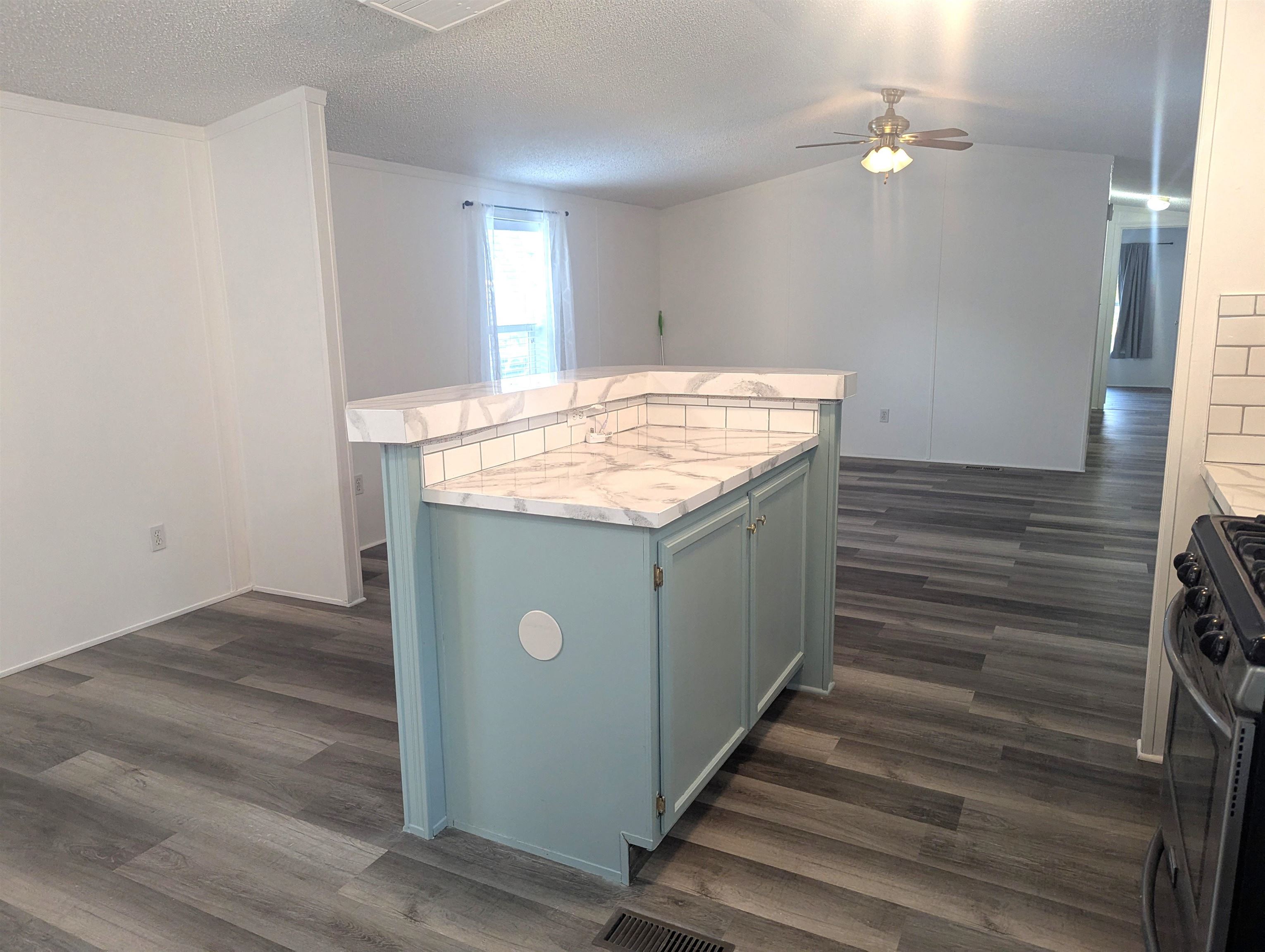 435 32 Road, Unit 254 Clifton, CO 81520 - Photo 4 of 21 a view of hallway with wooden floor