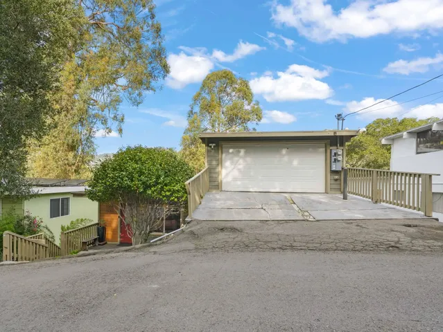 a view of a entrance gate of a house