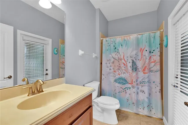 a bathroom with a sink and toilet