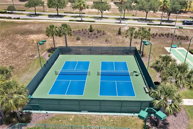 a view of swimming pool with a yard and seating area