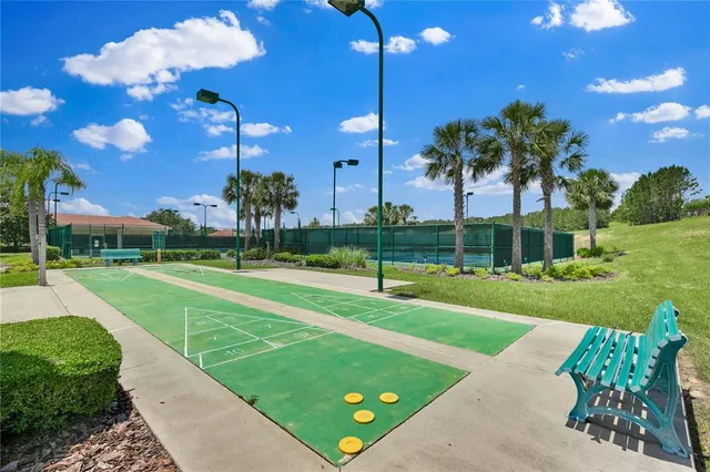 a view of a playground with a patio
