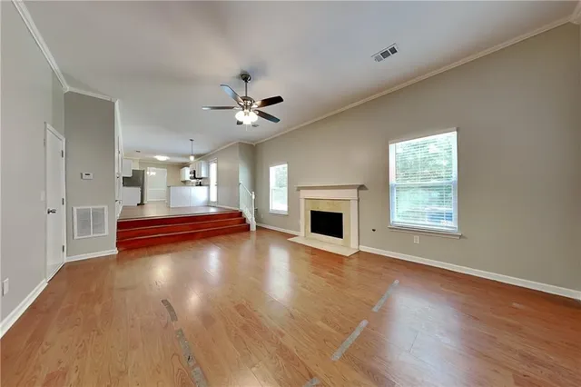 a view of livingroom and hall with wooden floor