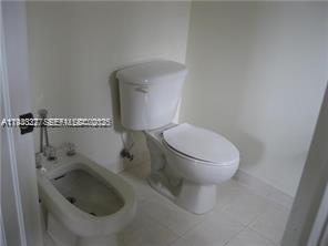 15847 Southwest 55th Terrace Miami, FL 33185 - Photo 10 of 13 a bathroom with a toilet and a sink