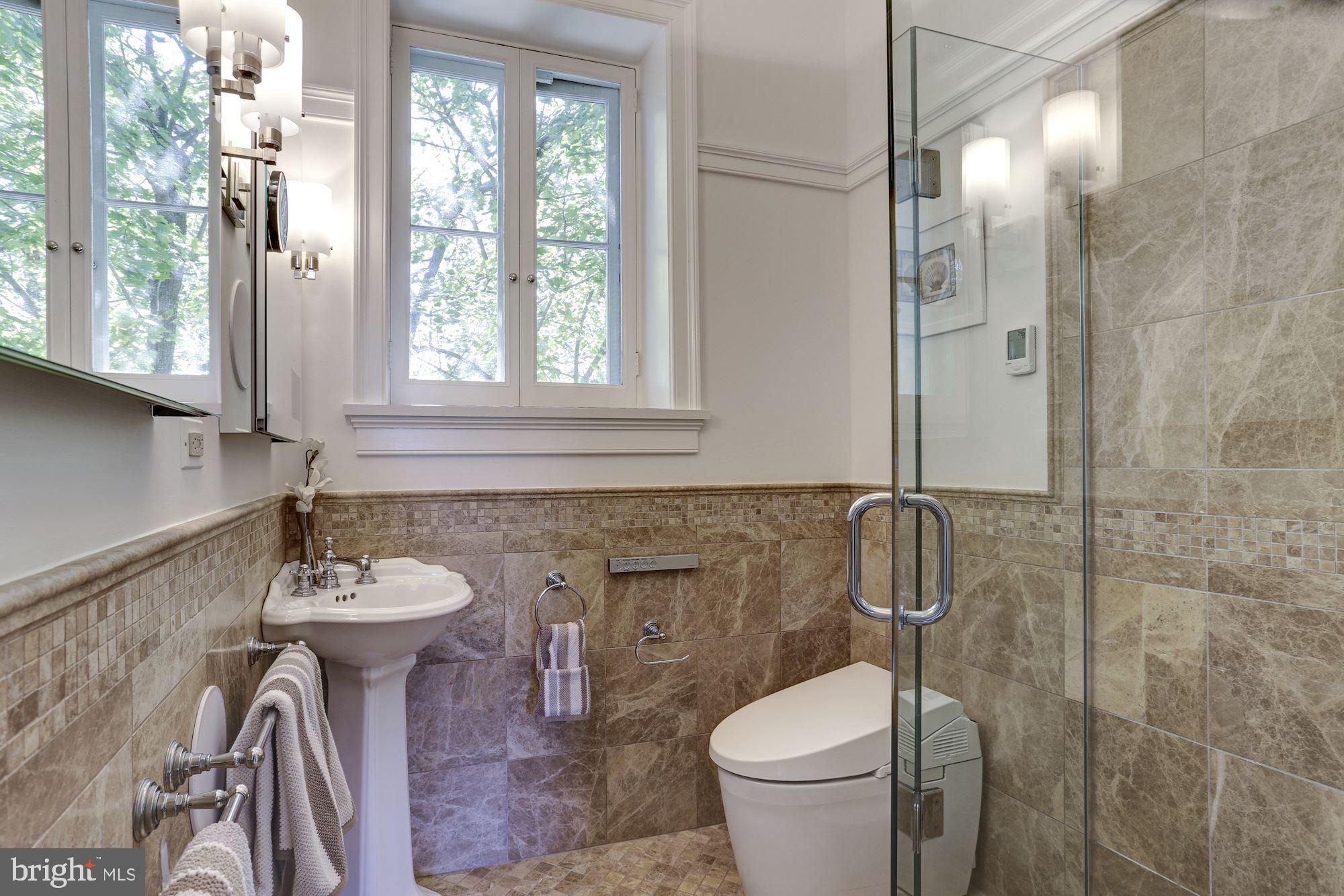 3306 R Street Northwest Washington, DC 20007 - Photo 13 of 24 Renovated full-bathroom with high-end fixtures.