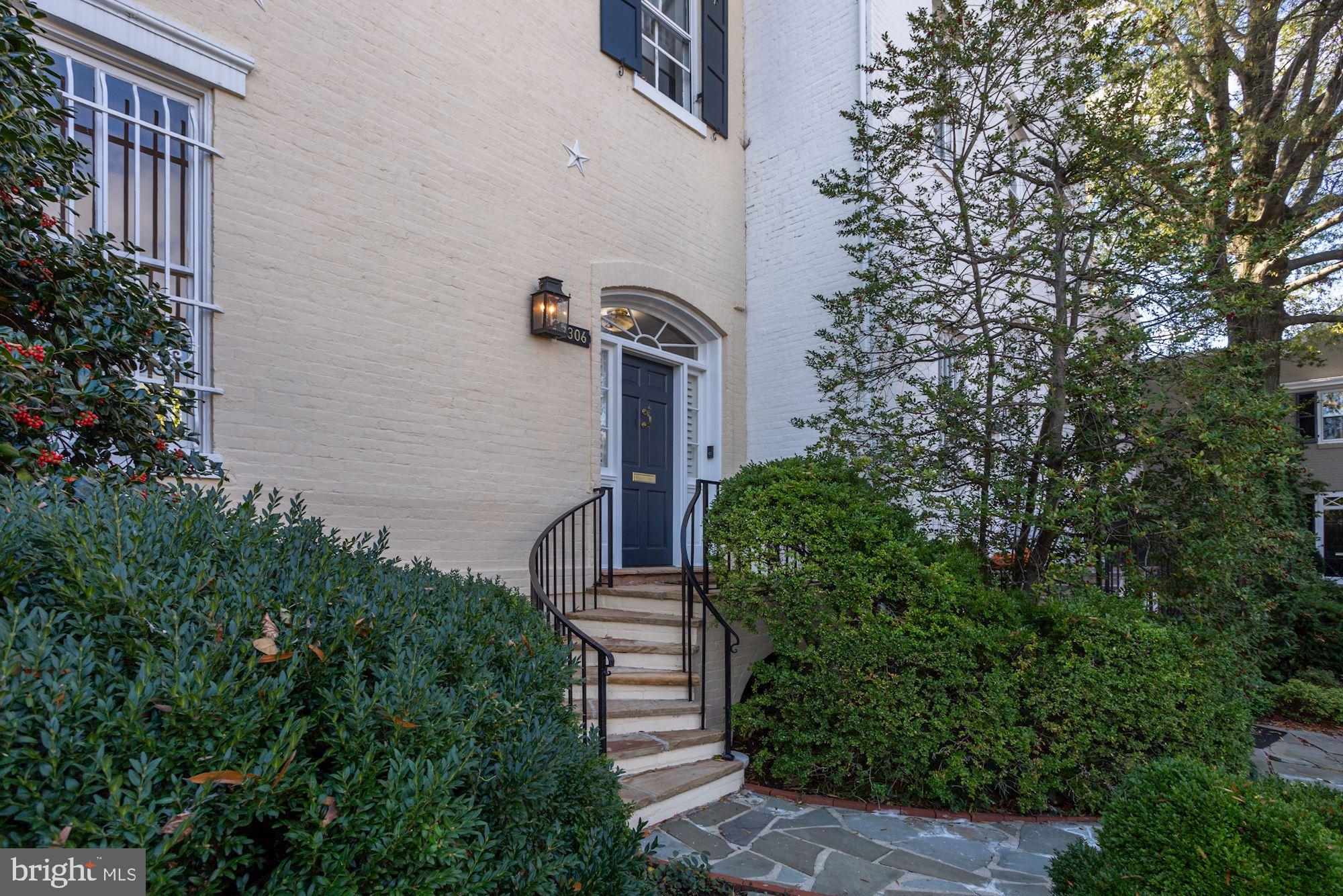 3306 R Street Northwest Washington, DC 20007 - Photo 2 of 24 Beautifully landscaped front yard.