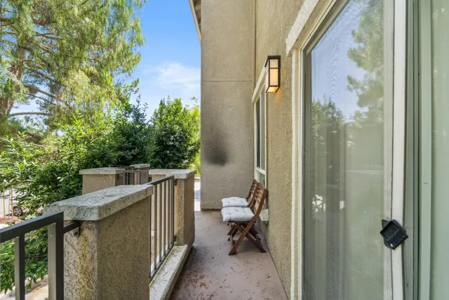 a view of a balcony with toilet