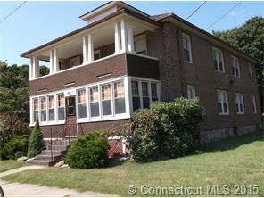 30 Watson Street Windham, CT 06226 - Photo 1 of 1 a front view of a house with a yard
