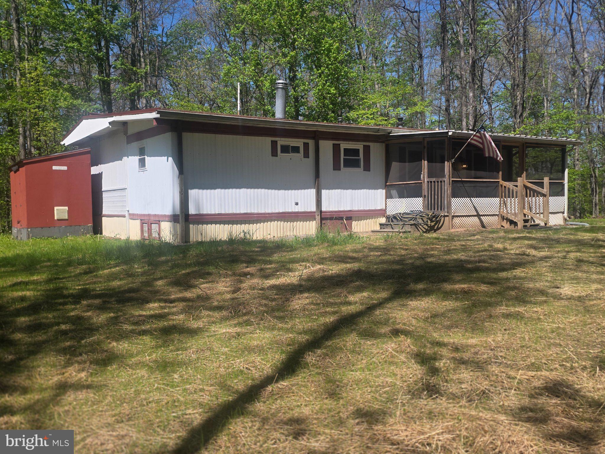 357 Gunsmoke Road Warfordsburg, PA 17267 - Photo 3 of 23 Charming retreat in a wooded setting.