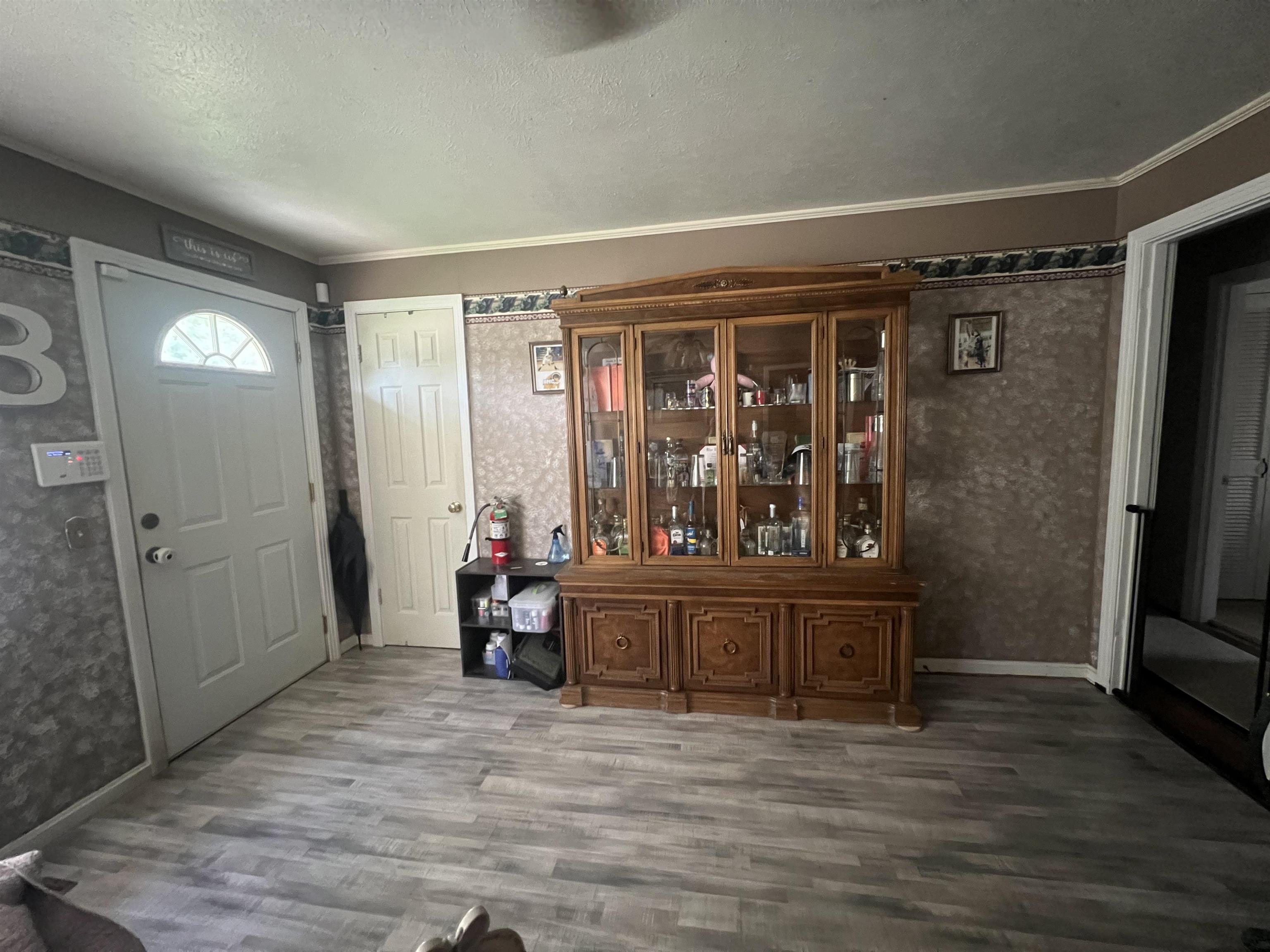 329 Mayflower Road Ramer, TN 38367 - Photo 10 of 20 Light wood-finish flooring extending throughout the space