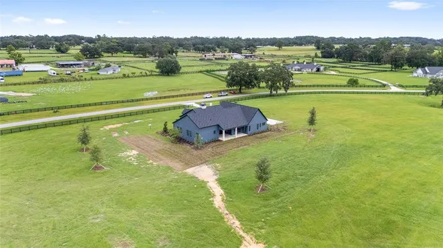a view of a swimming pool and a mountain view