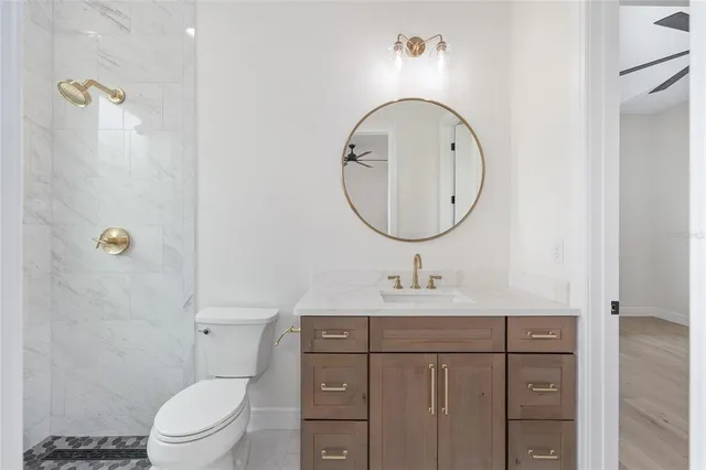 a backyard of a house with yard and outdoor seating