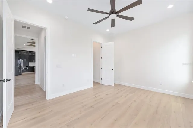 a view of an empty room with a large windows