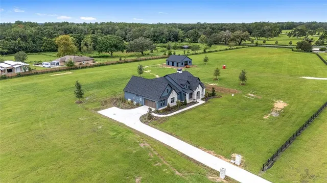 a view of a lake with a yard