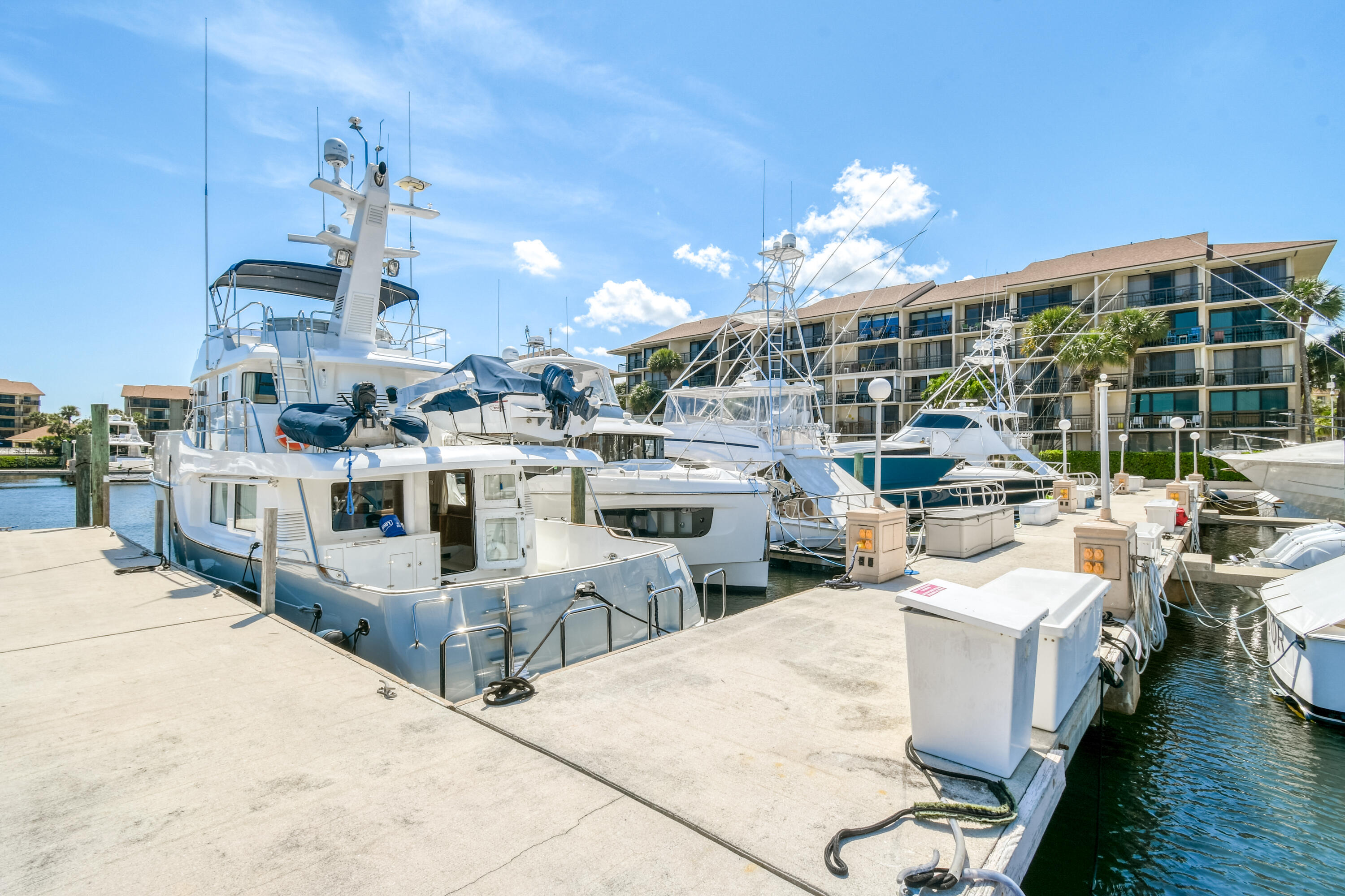 2401 Marina Isle Way, Unit 503 Jupiter, FL 33477 - Photo 42 of 46 a very nice looking room with lots of chairs and a table