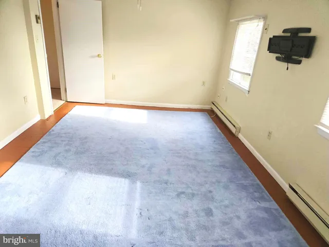 en empty room with windows