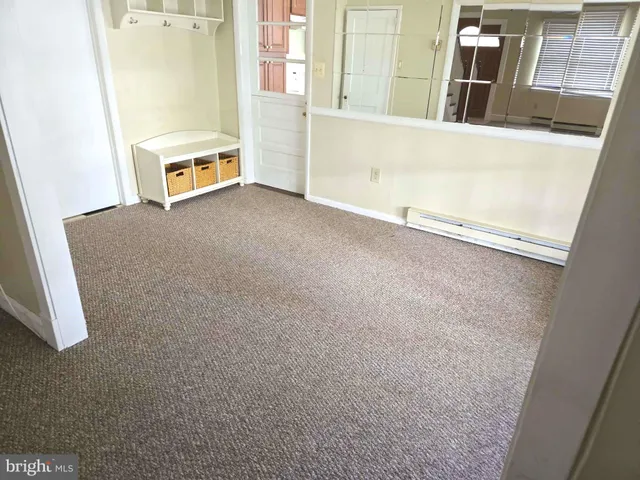 view of an empty room with a window