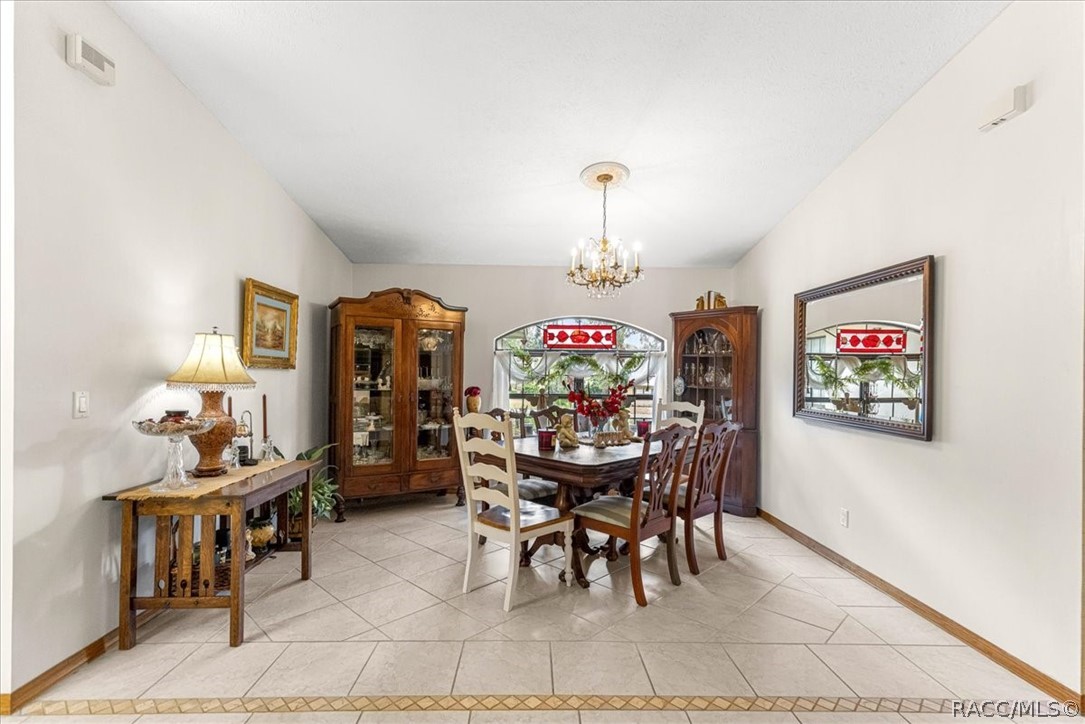2964 South Cygnet Terrace Inverness, FL 34450 - Photo 10 of 67 a view of a dining room with furniture