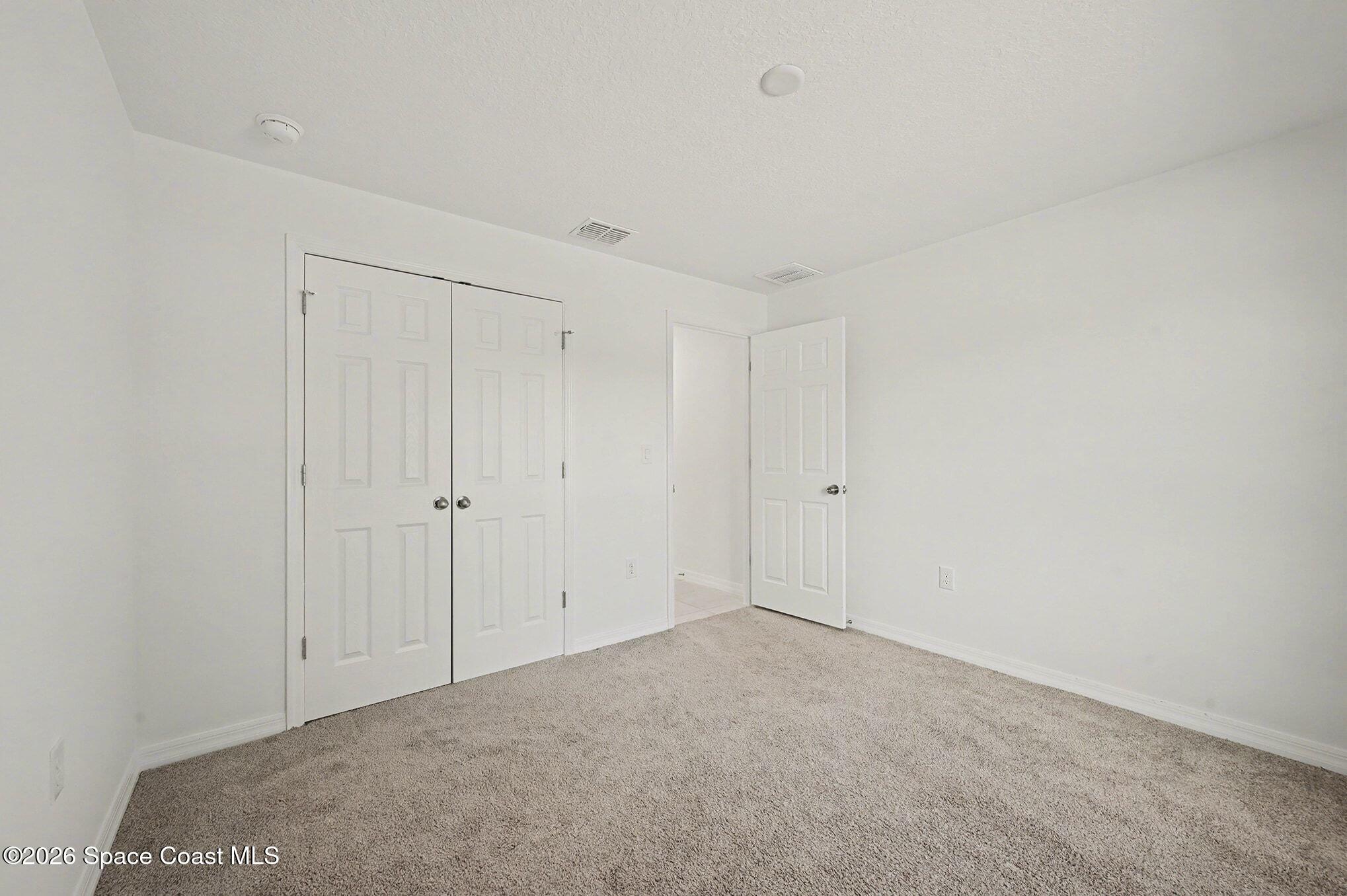 1743 Fairlight Street Northwest Palm Bay, FL 32907 - Photo 5 of 23 019_file_7670