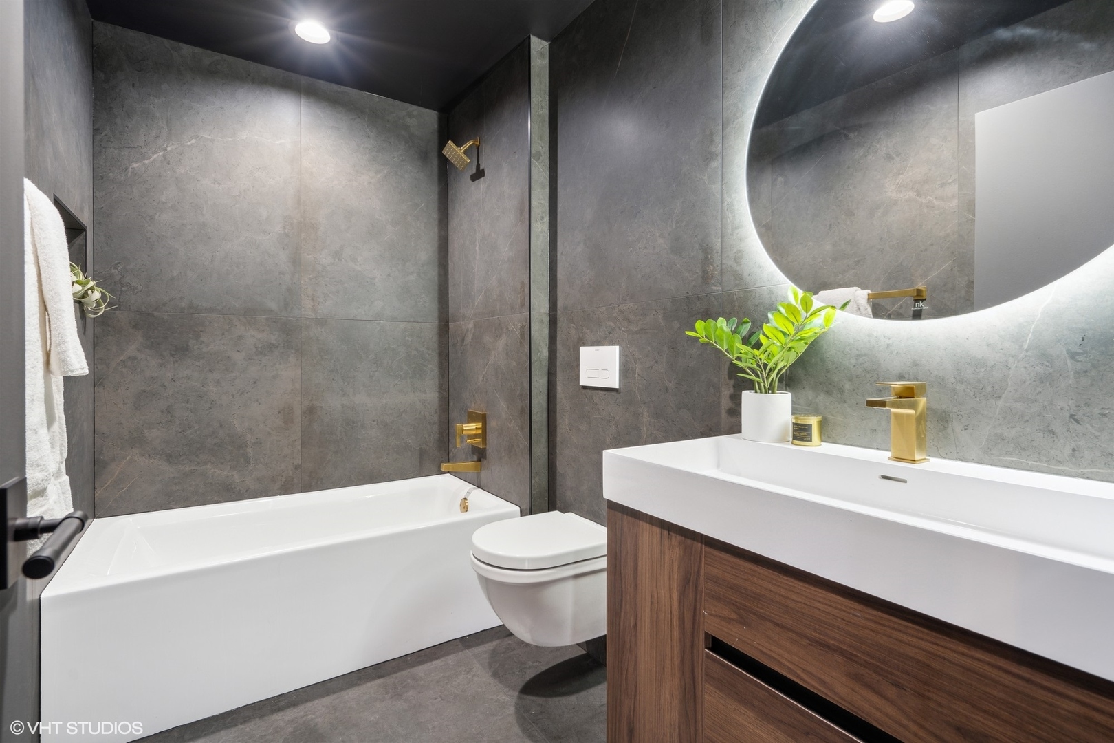 312 North May Street, Unit 6L Chicago, IL 60607 - Photo 11 of 14 a bathroom with a sink a toilet and shower