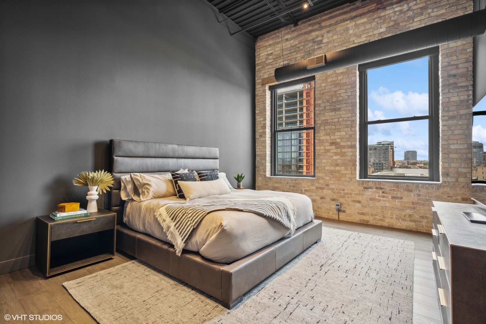 312 North May Street, Unit 6L Chicago, IL 60607 - Photo 12 of 14 a bedroom with a bed and a window