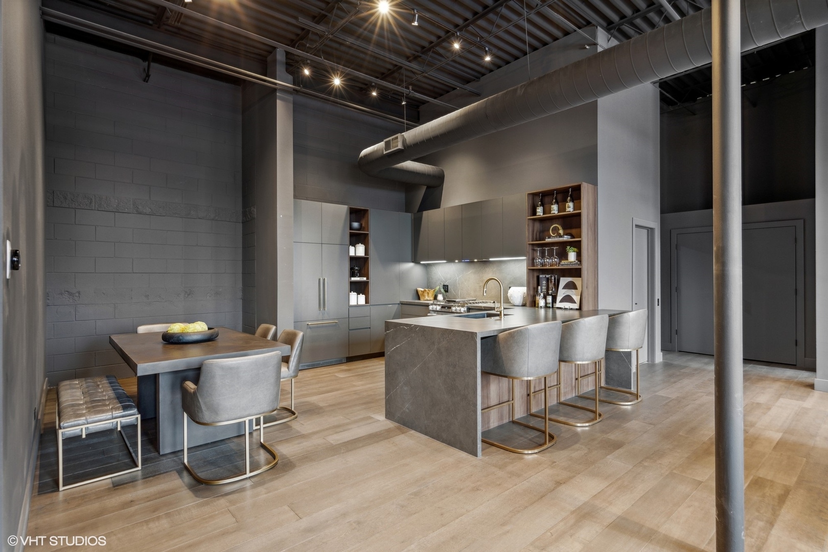 312 North May Street, Unit 6L Chicago, IL 60607 - Photo 4 of 14 a kitchen with a table and chairs in it