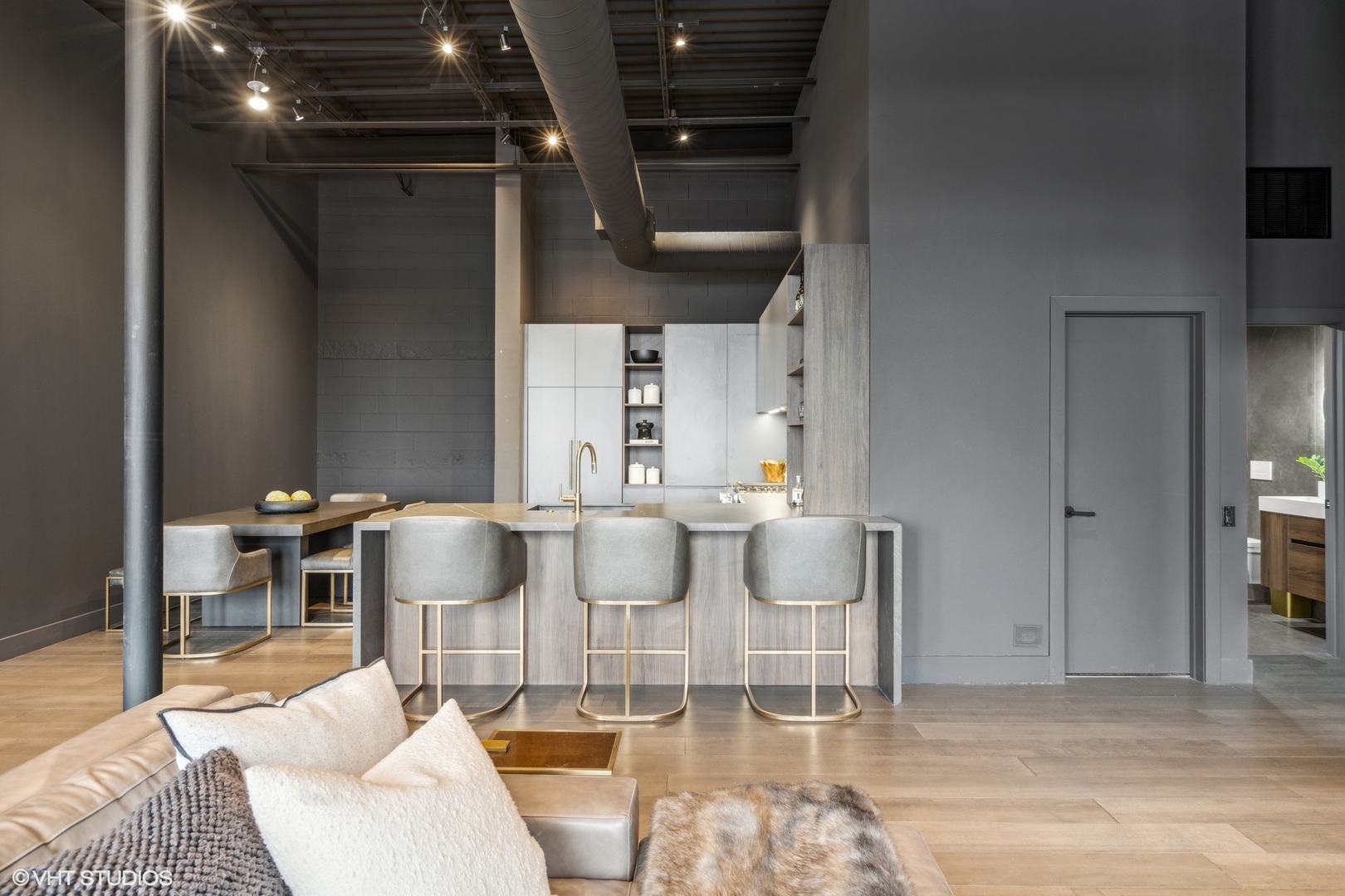 312 North May Street, Unit 6L Chicago, IL 60607 - Photo 7 of 14 a dining room with furniture and a floor to ceiling window