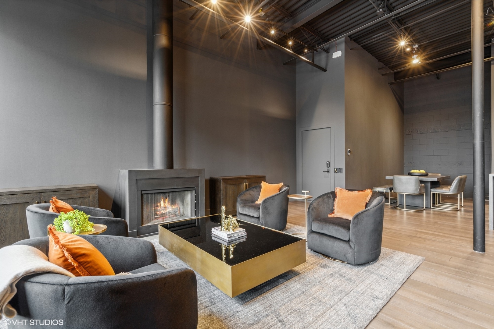 312 North May Street, Unit 6L Chicago, IL 60607 - Photo 10 of 14 a living room with furniture and a fireplace