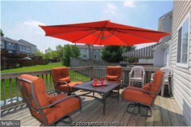 7417 Maury Road Windsor Mill, MD 21244 - Photo 14 of 19 a outdoor space with patio the couches and pool view