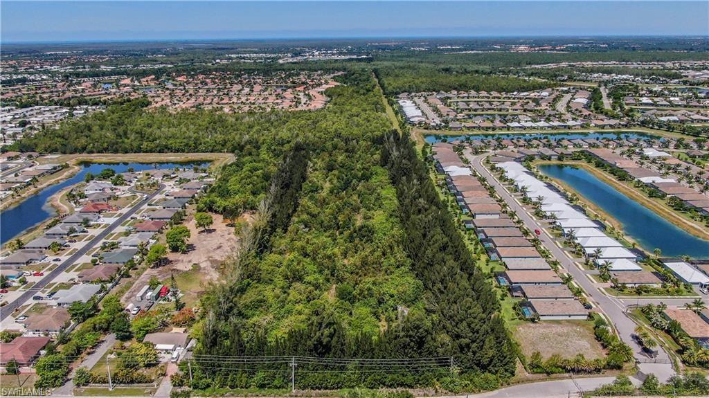 10113 Greenway Road Naples, FL 34114 - Photo 2 of 9 Bird's eye view with a water view