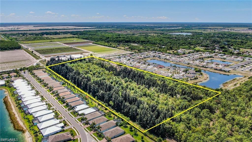 10113 Greenway Road Naples, FL 34114 - Photo 6 of 9 Drone / aerial view featuring a water view