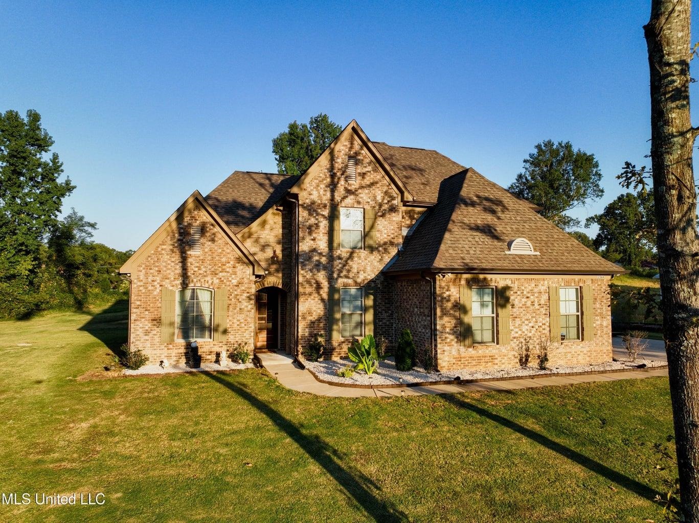 2364 Nikki Ridge Drive Nesbit, MS 38651 - Photo 1 of 26 a view of house with yard and swimming pool