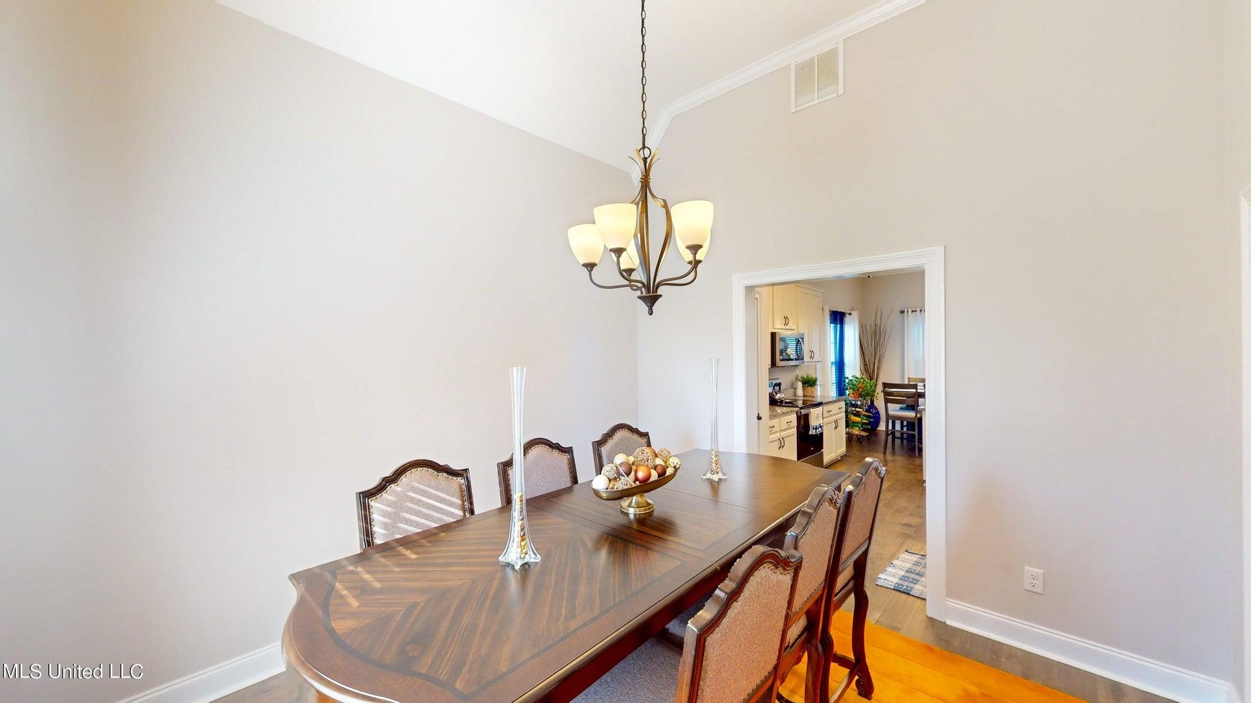 2364 Nikki Ridge Drive Nesbit, MS 38651 - Photo 11 of 26 a dining room with furniture and wooden floor
