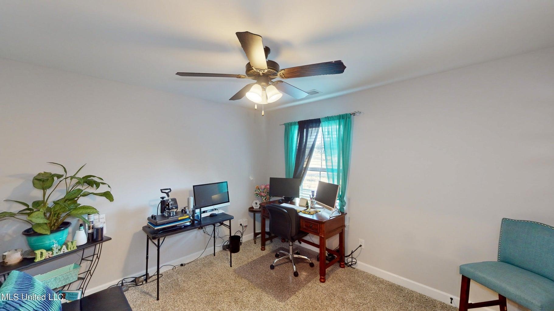 2364 Nikki Ridge Drive Nesbit, MS 38651 - Photo 21 of 26 a workspace with furniture and a potted plant