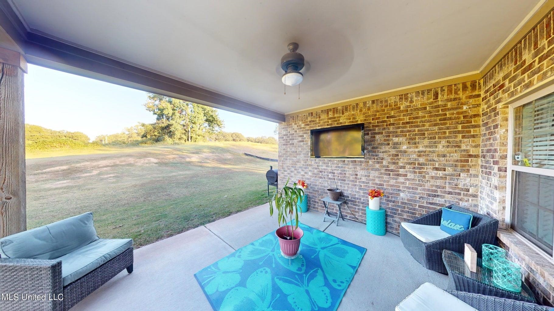 2364 Nikki Ridge Drive Nesbit, MS 38651 - Photo 23 of 26 a outdoor living space with furniture and garden view