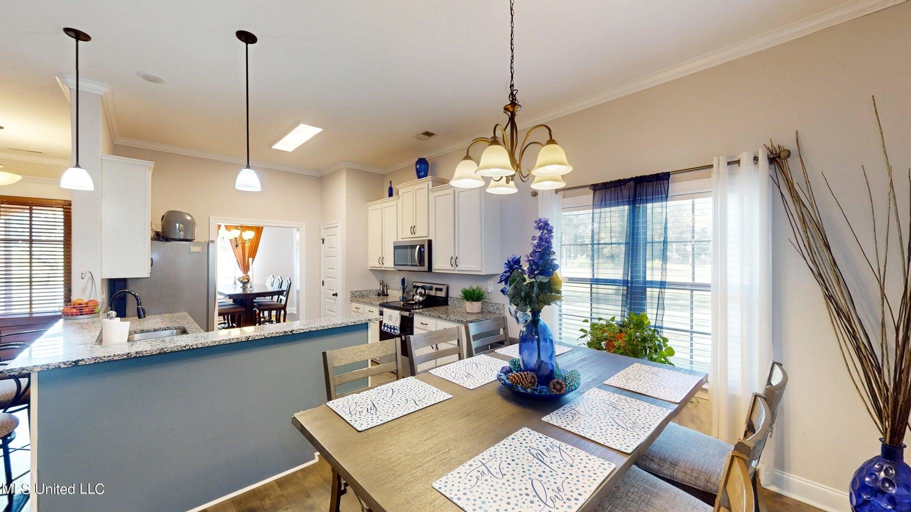 2364 Nikki Ridge Drive Nesbit, MS 38651 - Photo 8 of 26 a very nice looking dining room with a table and chairs