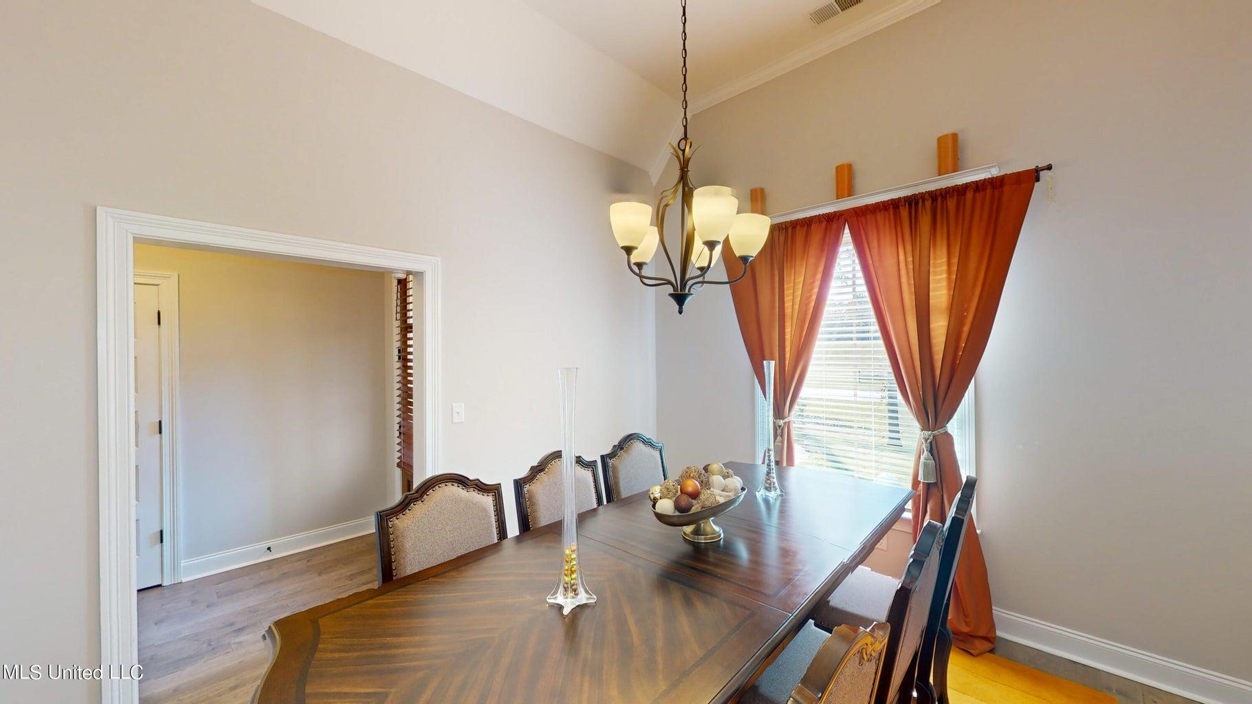 2364 Nikki Ridge Drive Nesbit, MS 38651 - Photo 10 of 26 a view of a dining room with furniture and a window
