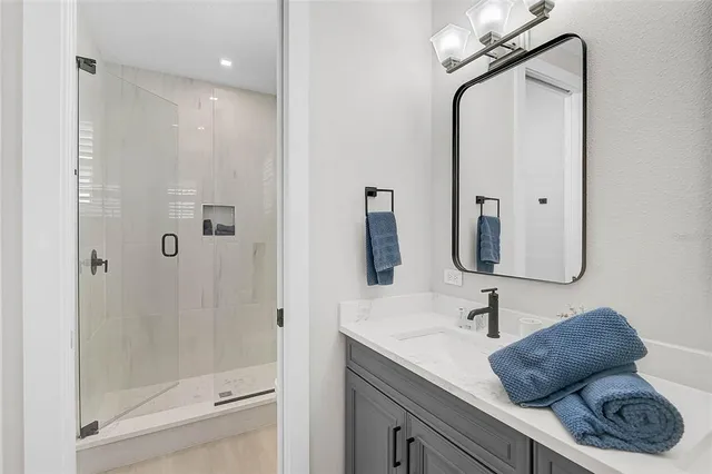 a view of a living room and floor to ceiling window