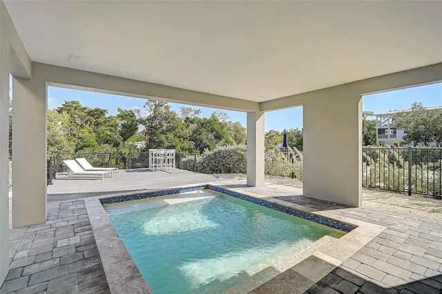 an aerial view of a city with lake view