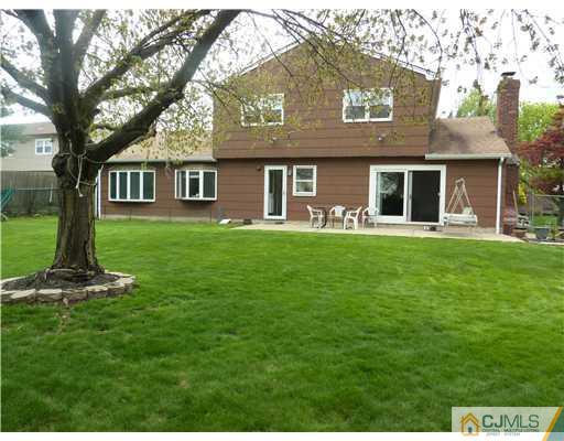 6 Purdue Road Edison, NJ 08820 - Photo 2 of 15 a front view of a house with a yard