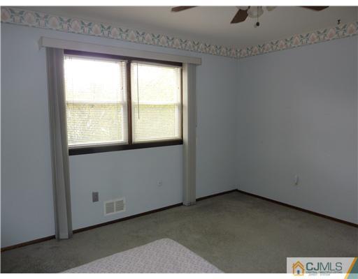 6 Purdue Road Edison, NJ 08820 - Photo 13 of 15 an empty room with a window