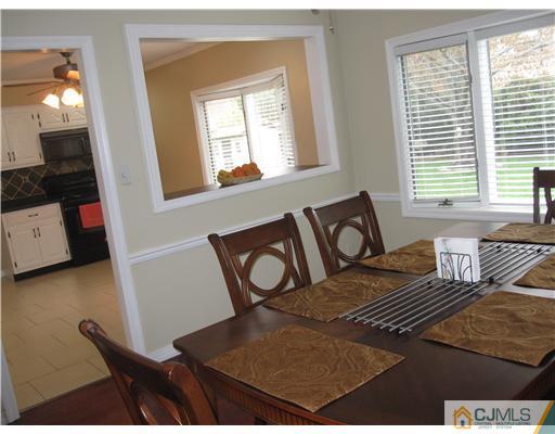 6 Purdue Road Edison, NJ 08820 - Photo 4 of 15 a view of a dining room with furniture