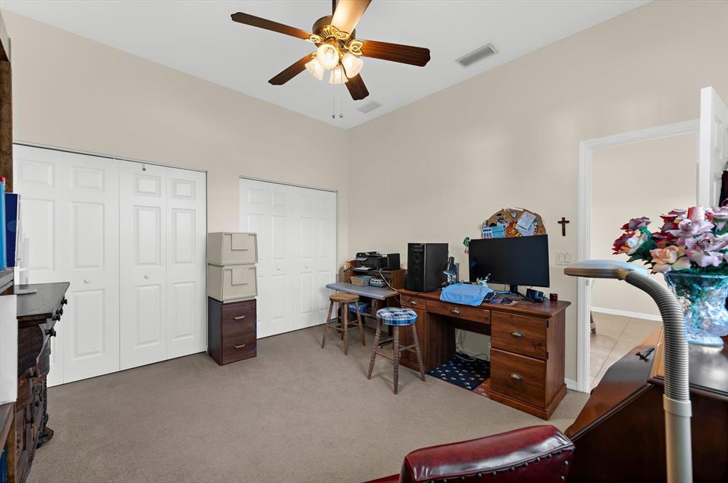 615 May Apple Way Venice, FL 34293 - Photo 30 of 94 a view of a workspace with furniture and a window