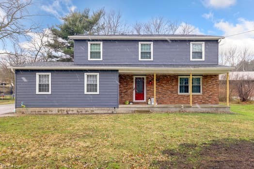 4618 South Arlington Road Uniontown, OH 44685 - Photo 1 of 31 Front facade with a front yard