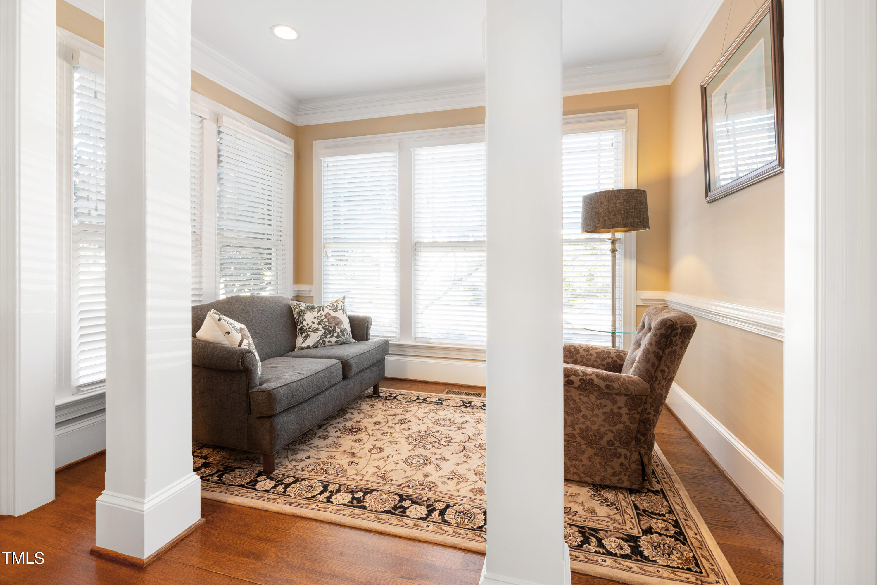 229 Woodburn Road Raleigh, NC 27605 - Photo 16 of 64 a living room with furniture and a window